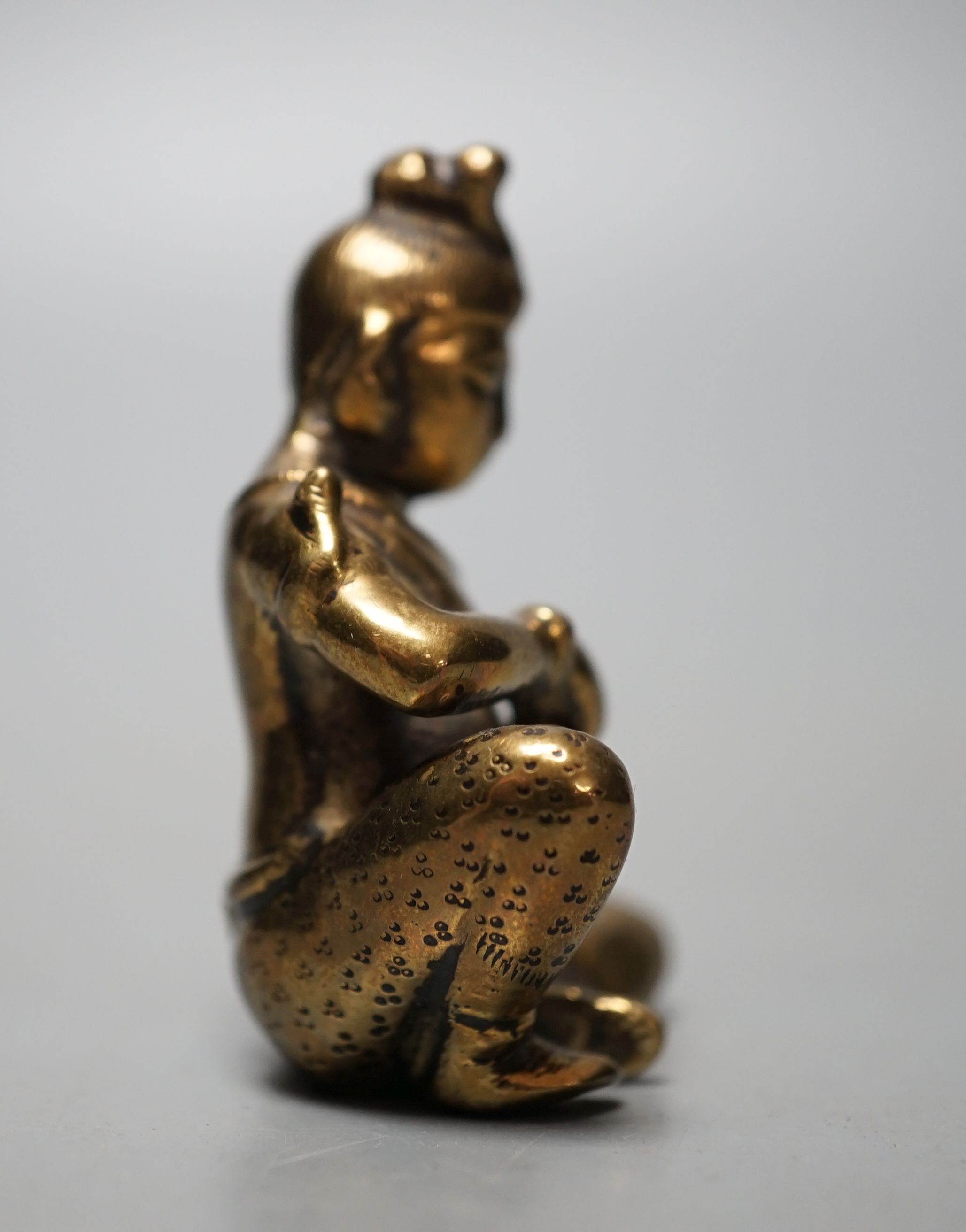 A 19th century bronze Buddhist seated figure 5.5cm